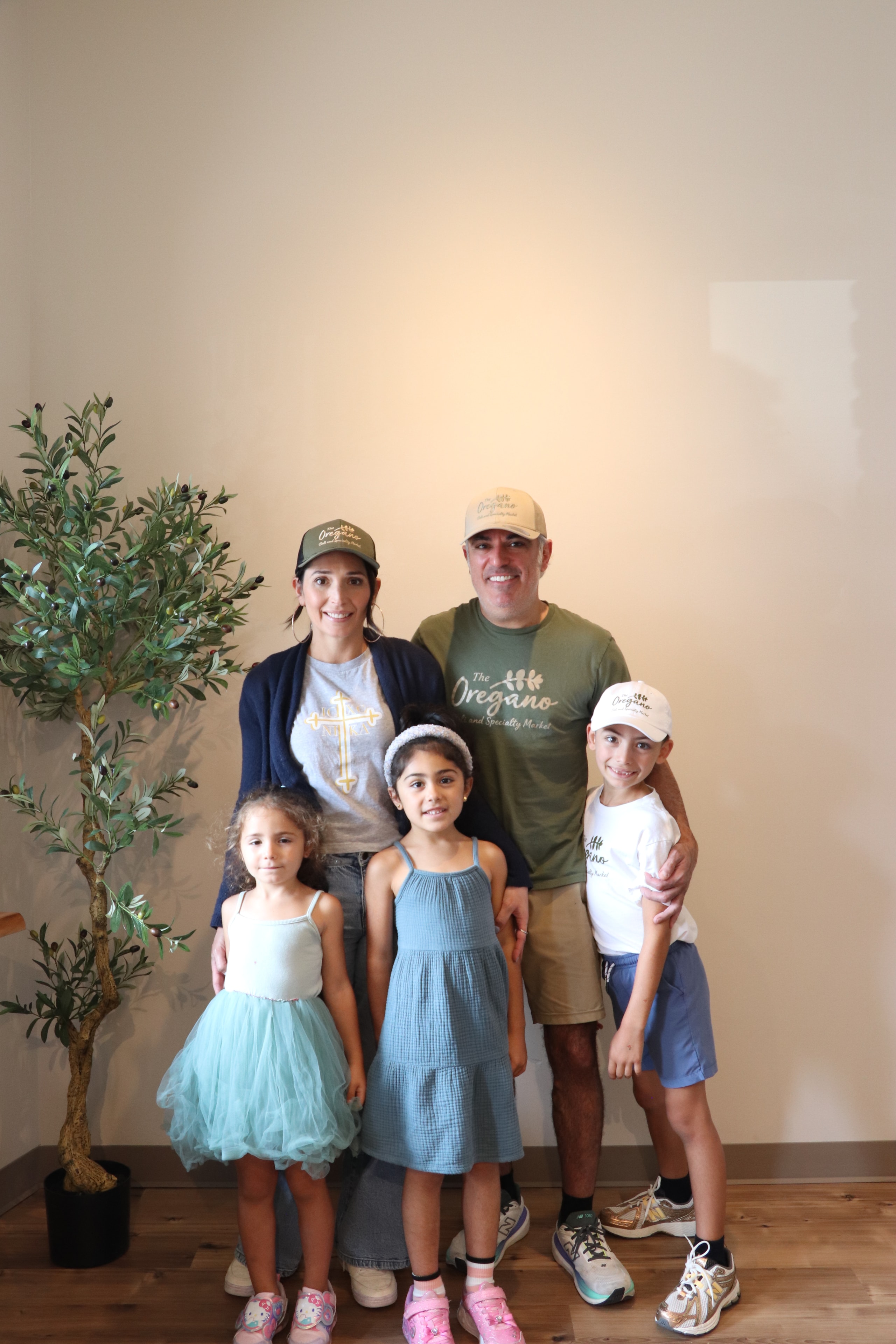 Brandon and his family at The Oregano Deli